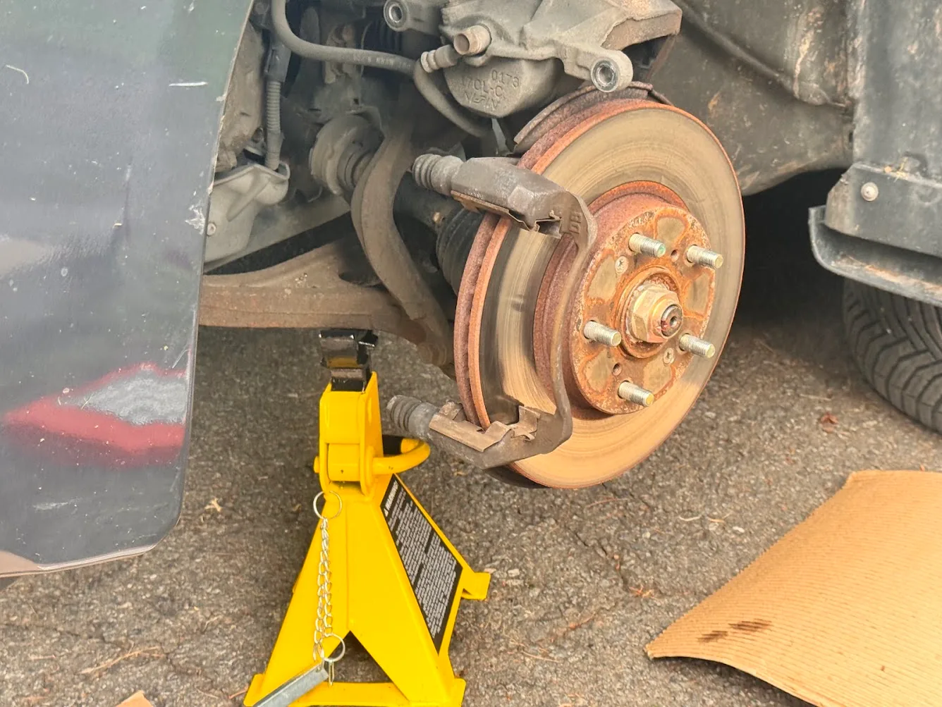 2005 Honda Accord EX V6 front brake assembly during Akebono pad replacement