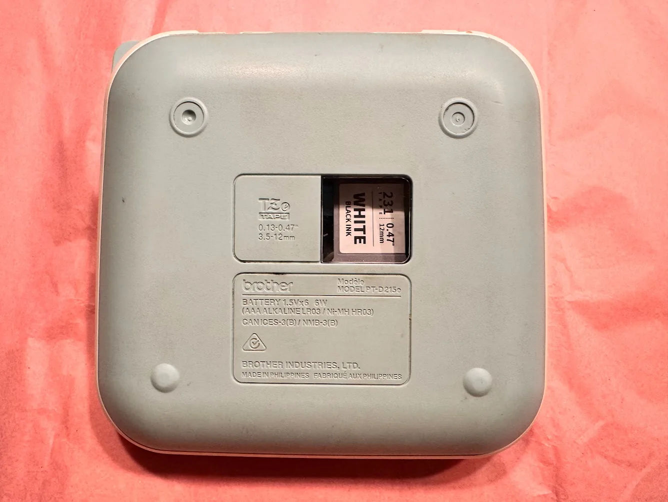 Back of Brother PT-D215e showing tape cartridge