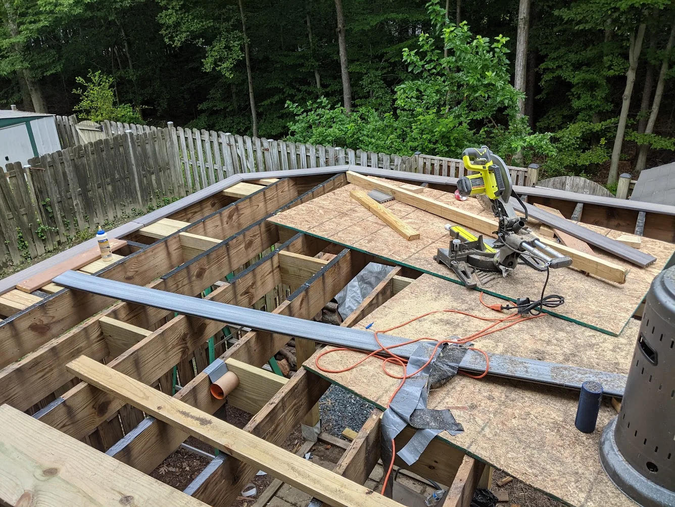Composite deck project with framing exposed during real construction work