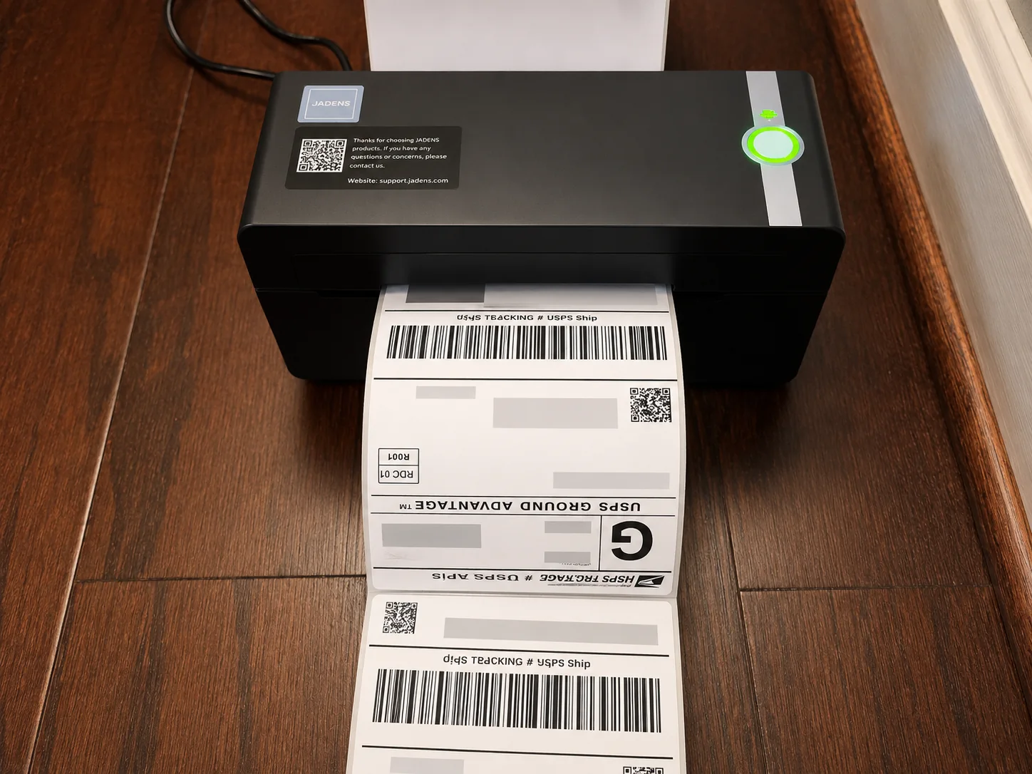 JADENS printer producing 4x6 shipping labels with private customer details removed