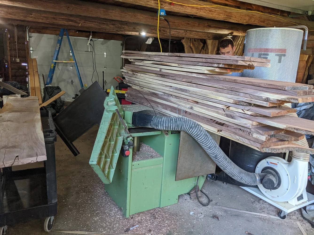 Large woodworking machine and JET collector handling shop dust