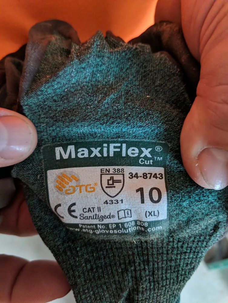 MaxiFlex Cut work glove label showing model 34-8743 size 10 XL