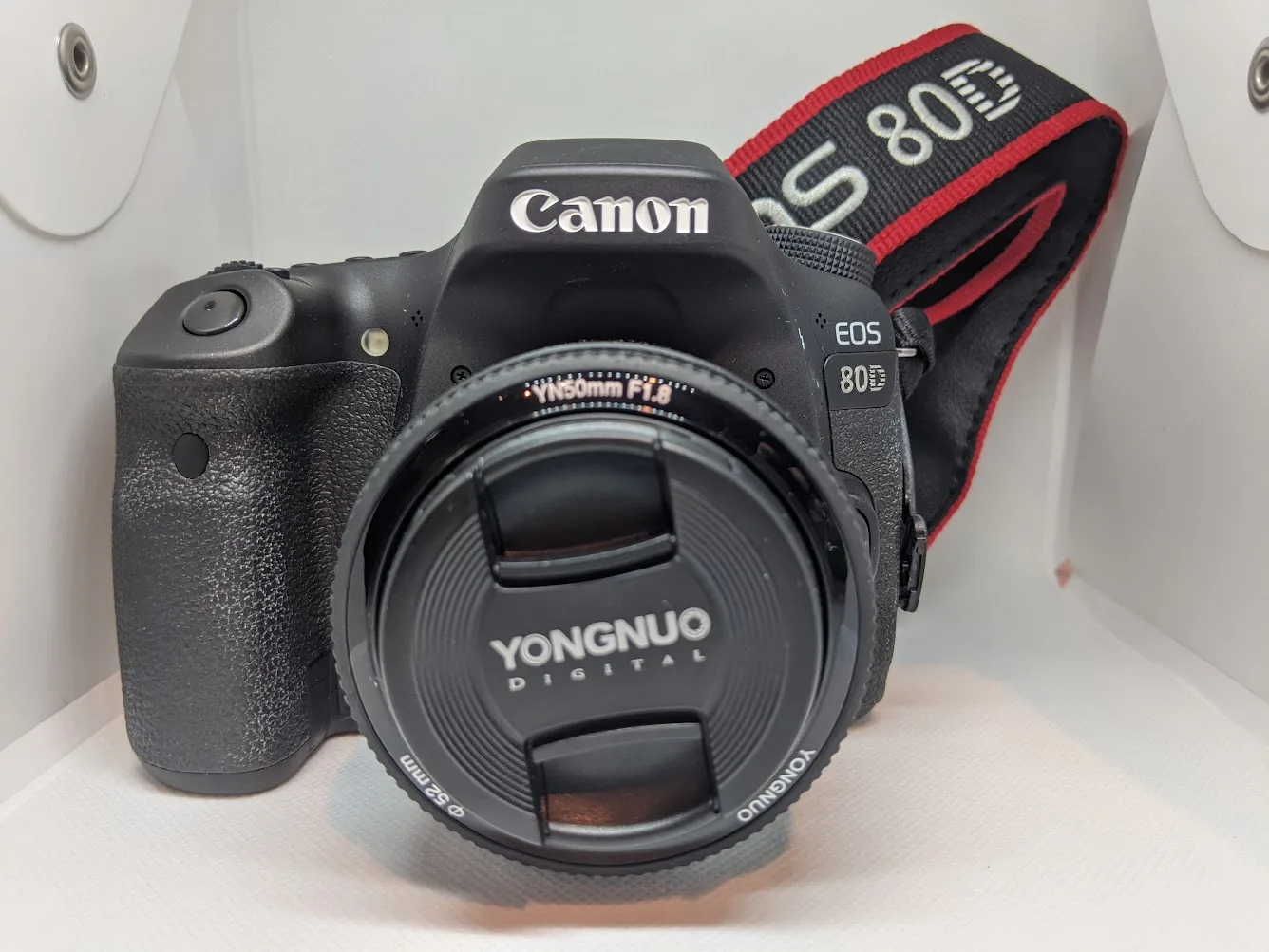 Our Canon EOS 80D with Yongnuo 50mm f/1.8 lens used for German passport photos
