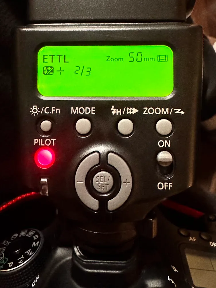 Canon Speedlite display during passport photo setup