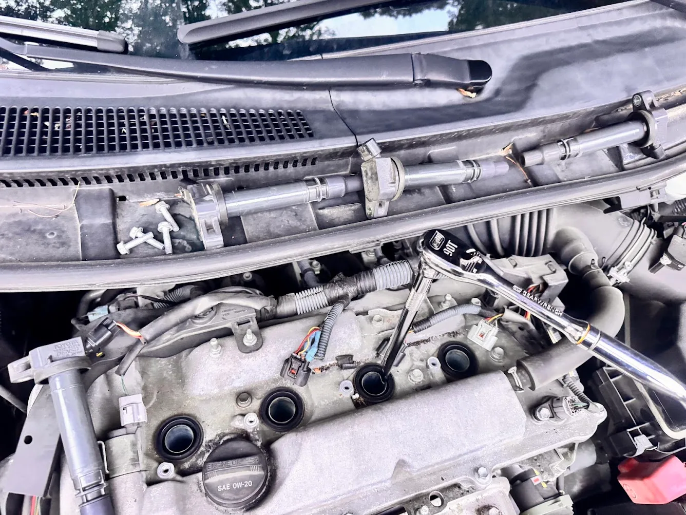 Long GEARWRENCH extension used to reach a spark plug on a 2012 Scion tC