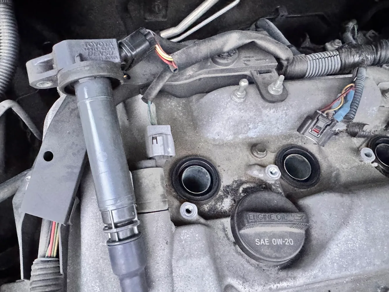 Scion tC ignition coil pulled from the spark plug well