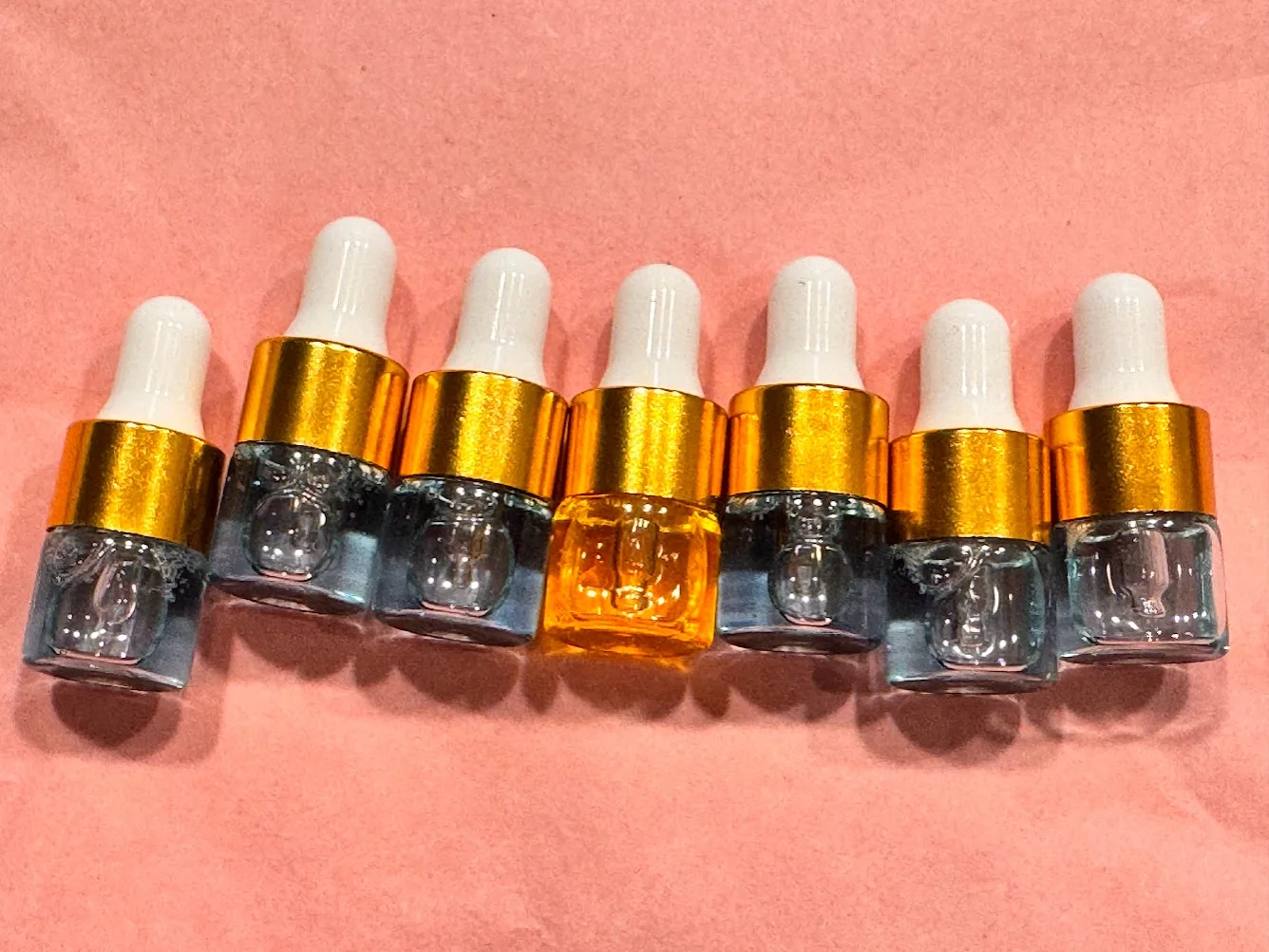 Small glass dropper sample bottles